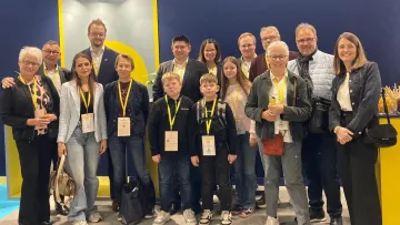 Menschen auf der Messe