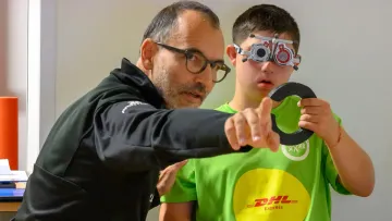 Sportler bei der subjektiven Refraktion 