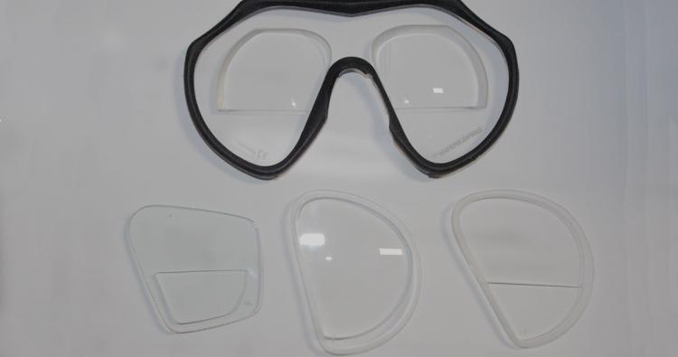 Tauchmaske und verschiedene Gläser